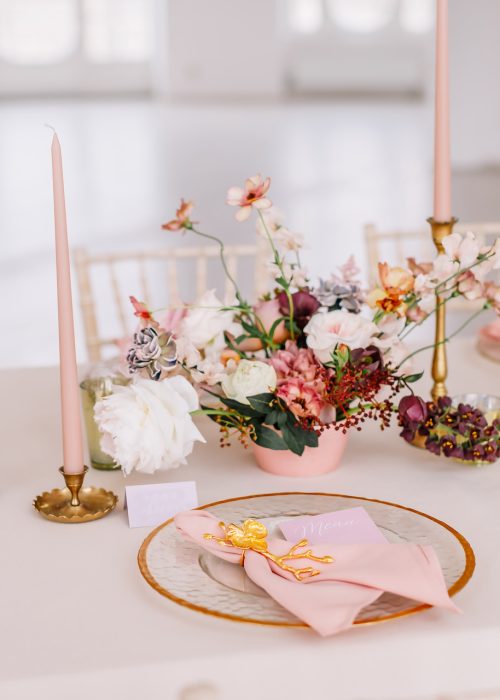 Wedding decoration table in the hall, floral arrangement. In the style vintage. Decorated dining table with flowers for guests and newlyweds, in peach-pink & pastel color. Beautiful table setting.